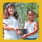 kids with tree to plant